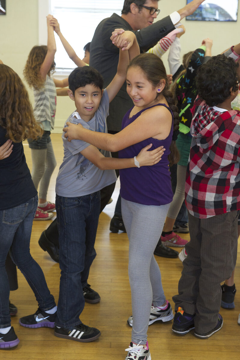 Students partner dancing