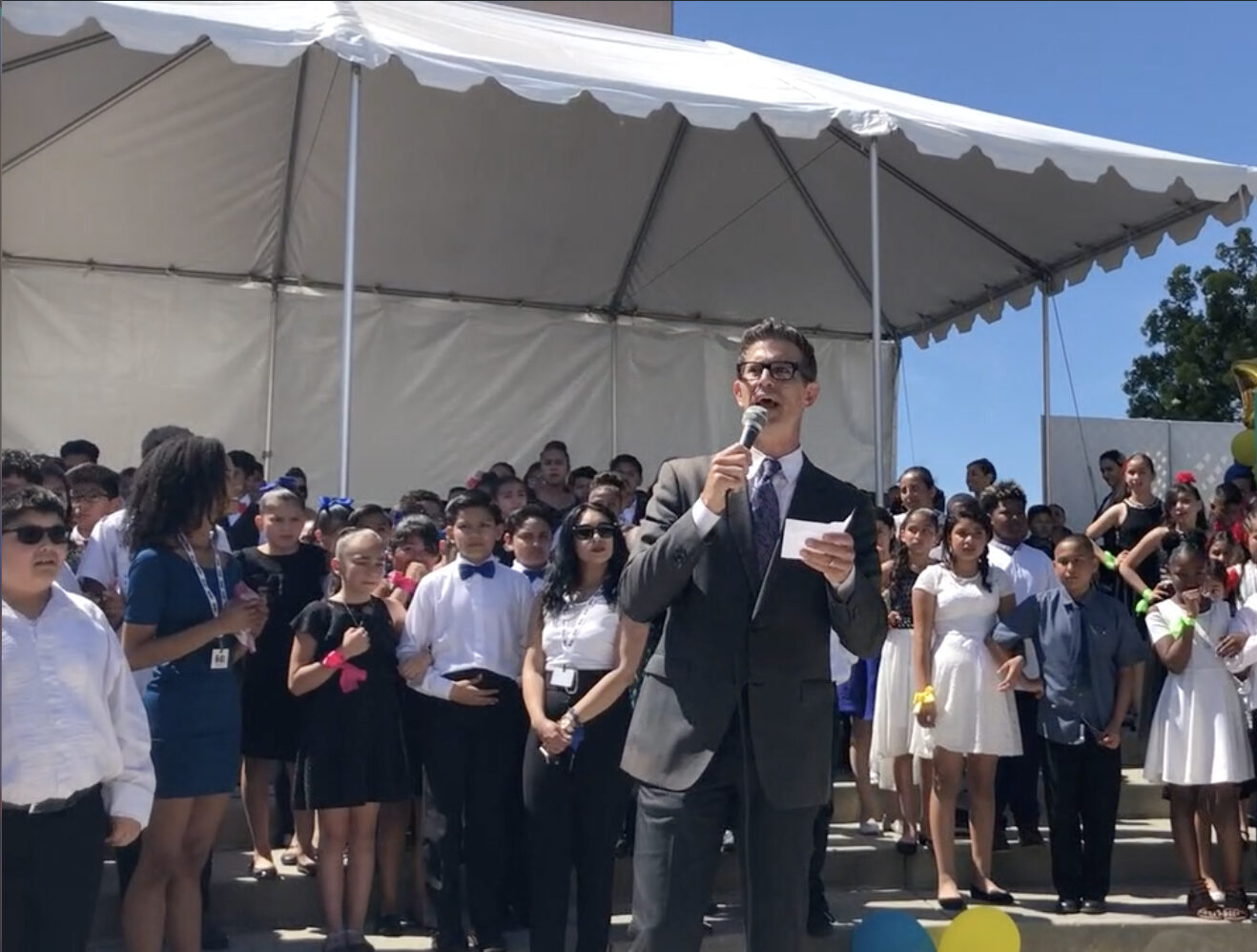 Daniel Ponickly addressing students on the mic